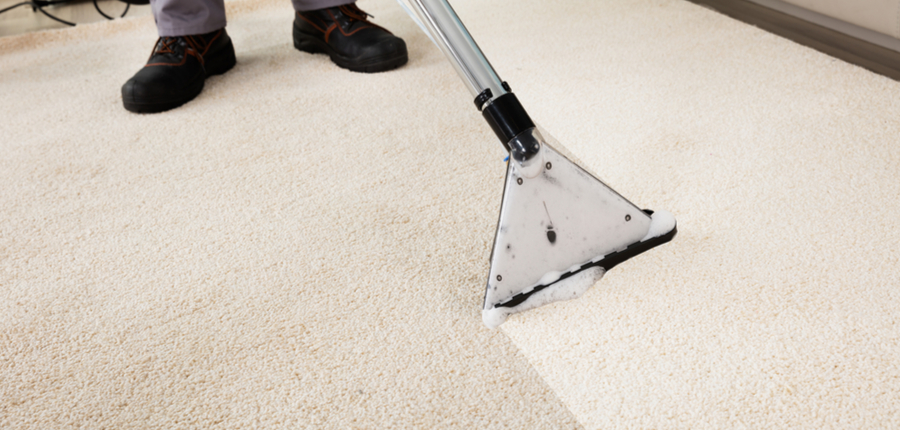 cleaning of carpet with vacuum cleaner