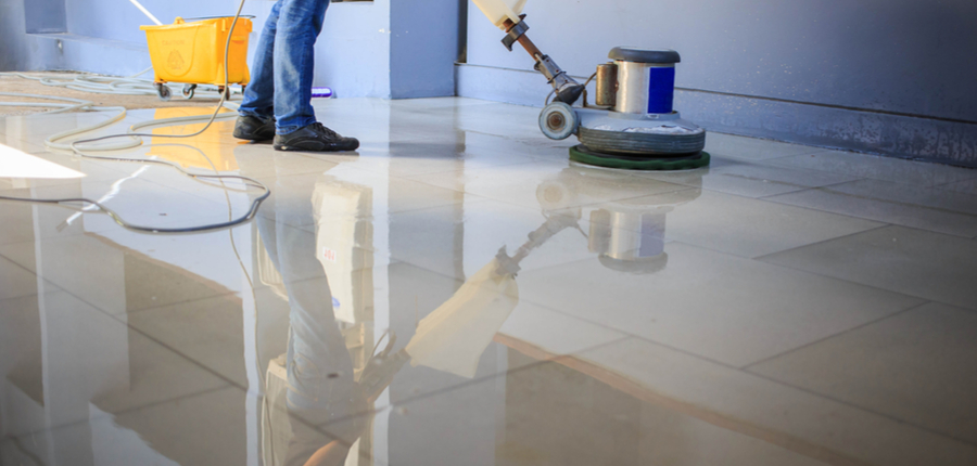 cleaning the floor with machine